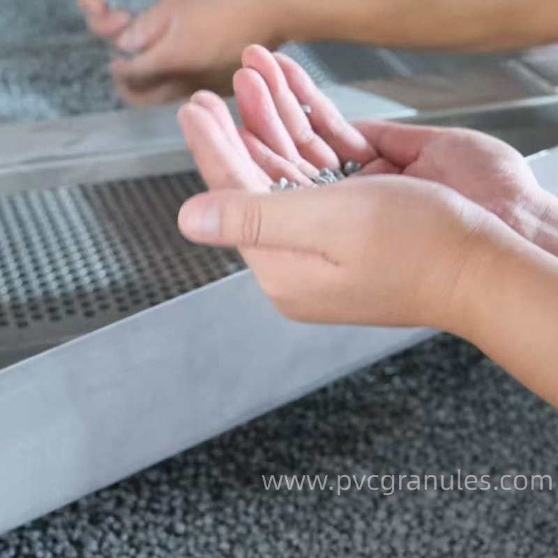 A quality control inspector testing PVC compound samples in a lab
